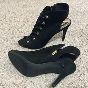 Fits 9.5-11. Stiletto Victorian button style open toe black bootie heels